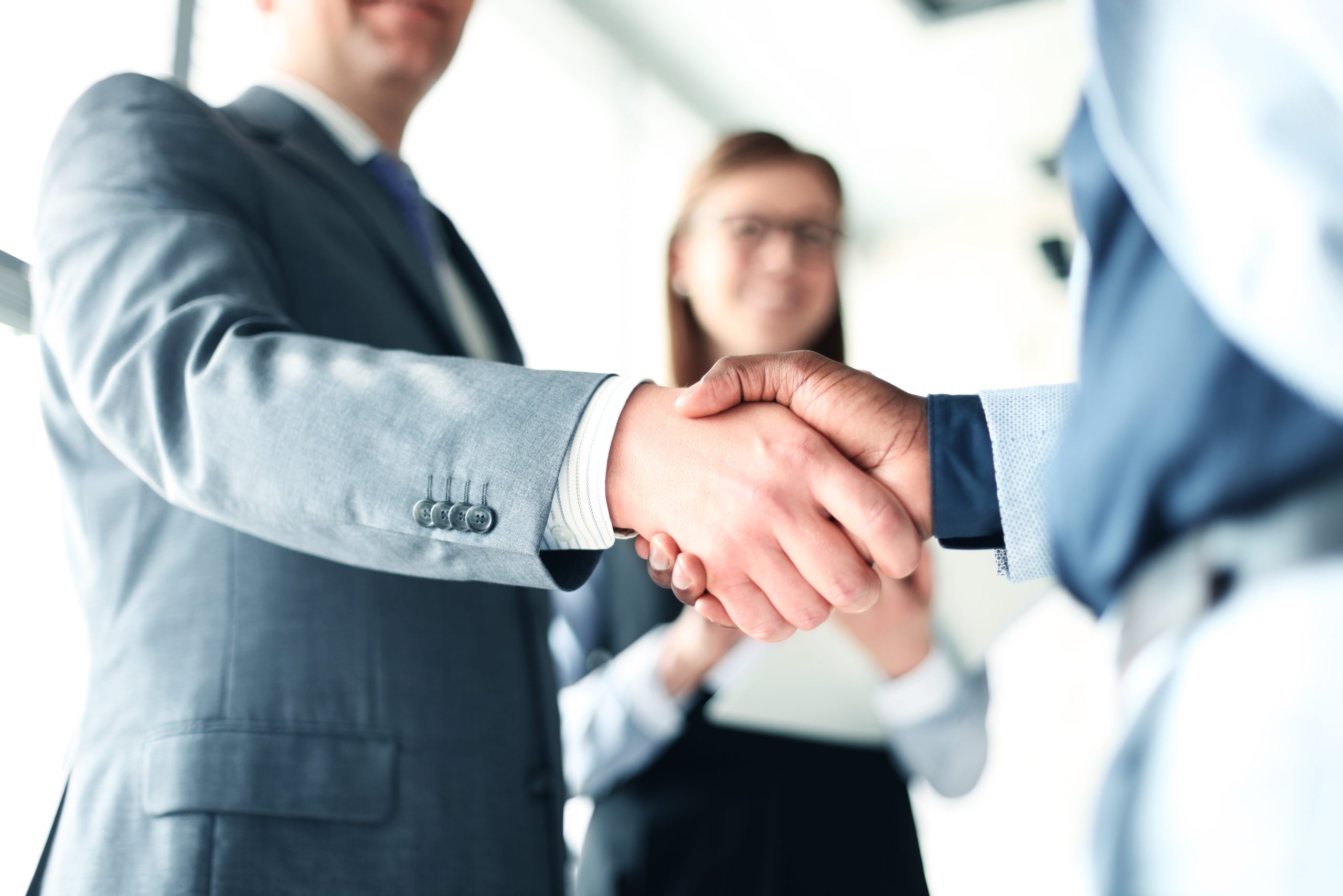 Well dressed men shaking hands